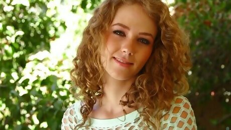 Curly-haired babe Kimber Day gives her boyfriend one hell of a blowjob