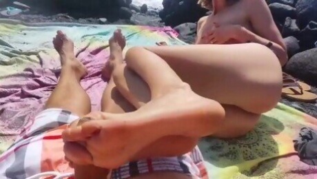 Footjob at public Tenerife beach