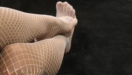 Fishnet Stockings to satisfy your foot fetish.